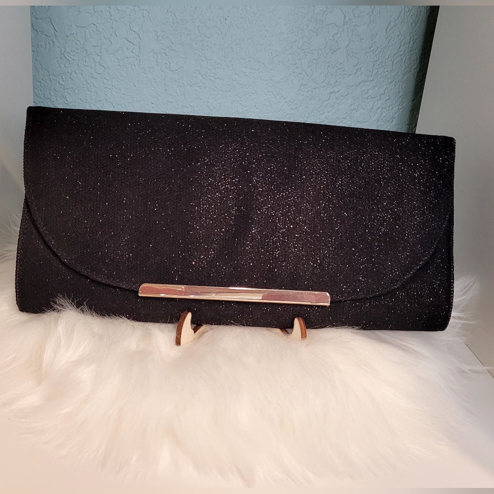Call it Spring Black Clutch